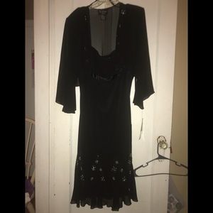 Black evening dress with sheer jacket